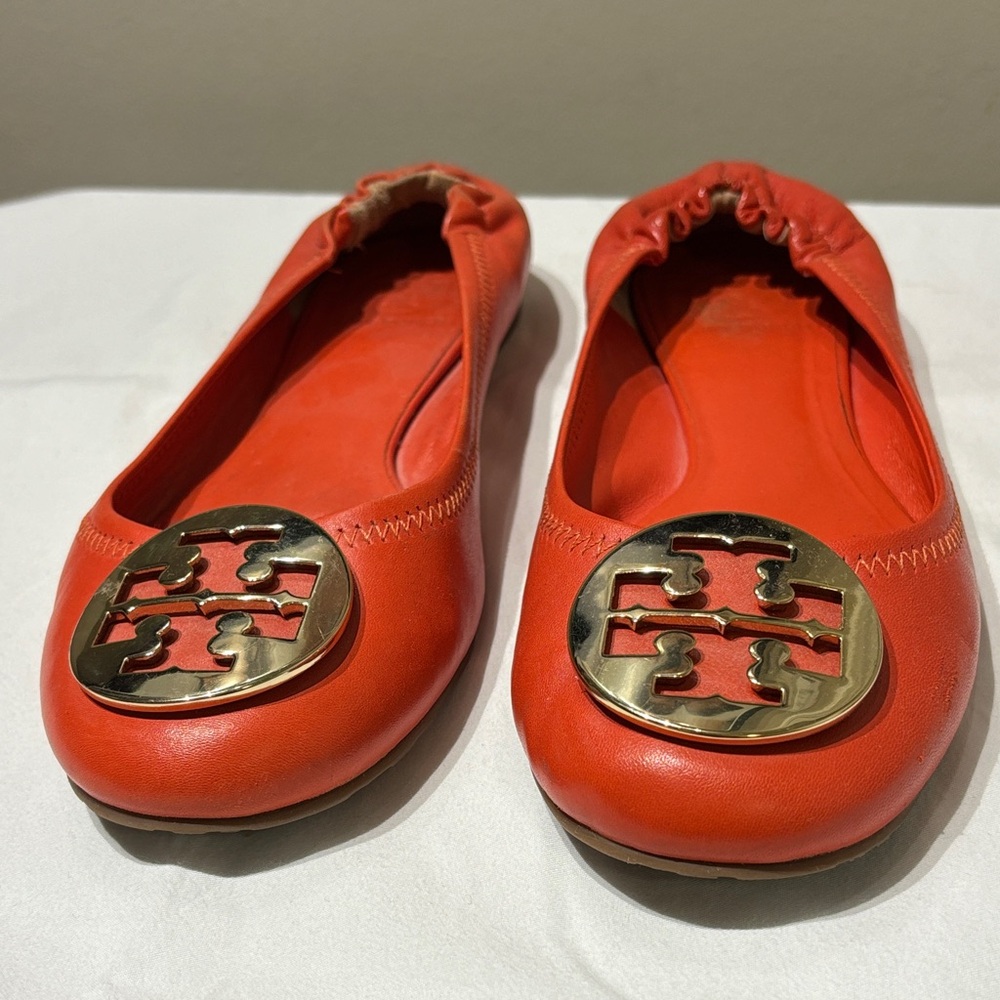 Tory Burch Women's Orange Ballet Flats with Gold Emblem